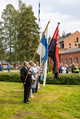 Suomen lippu, Karjalan Liiton lippu, Karjalan Liiton Päijät-Hämeen piirin lippu ja Lahden Karjalaseuran lippu.